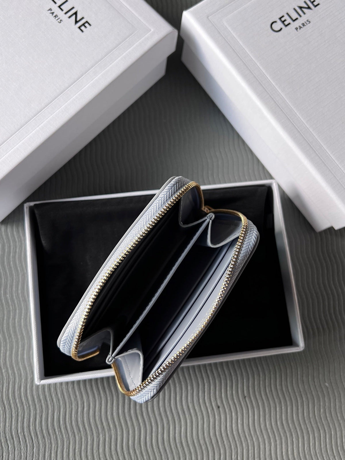 TRIOMPHE Compact Zipped Wallet Glacier Cowhide Leather